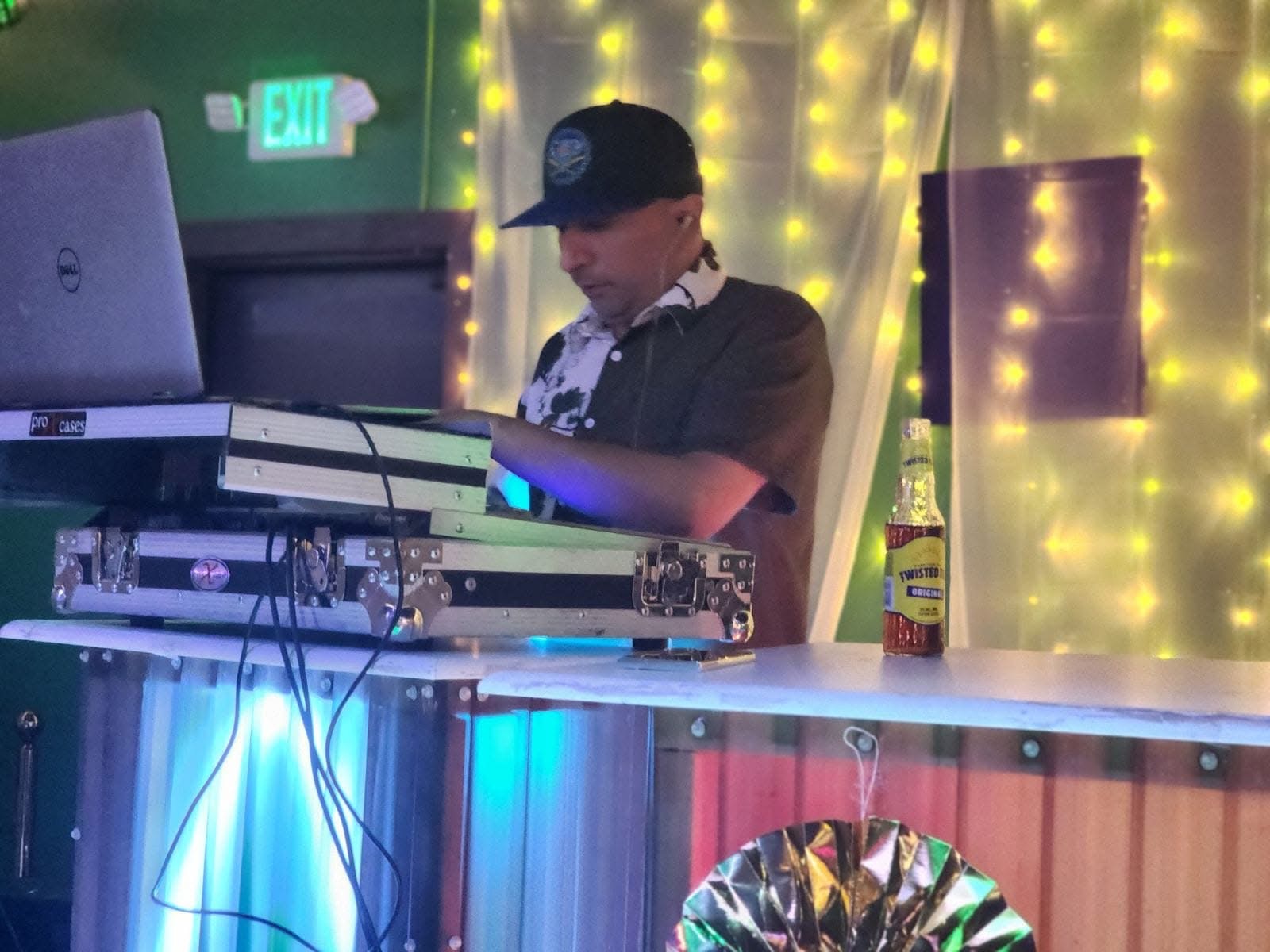 DJ R Styles mixing under fairy lights