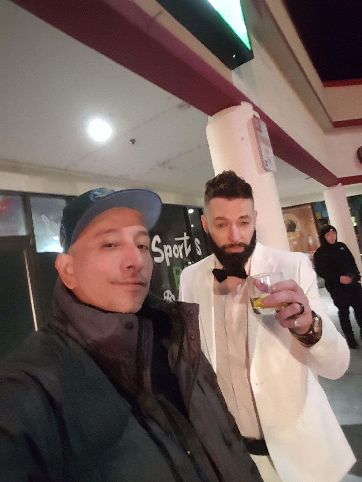 DJ R Styles with a guest at a formal event